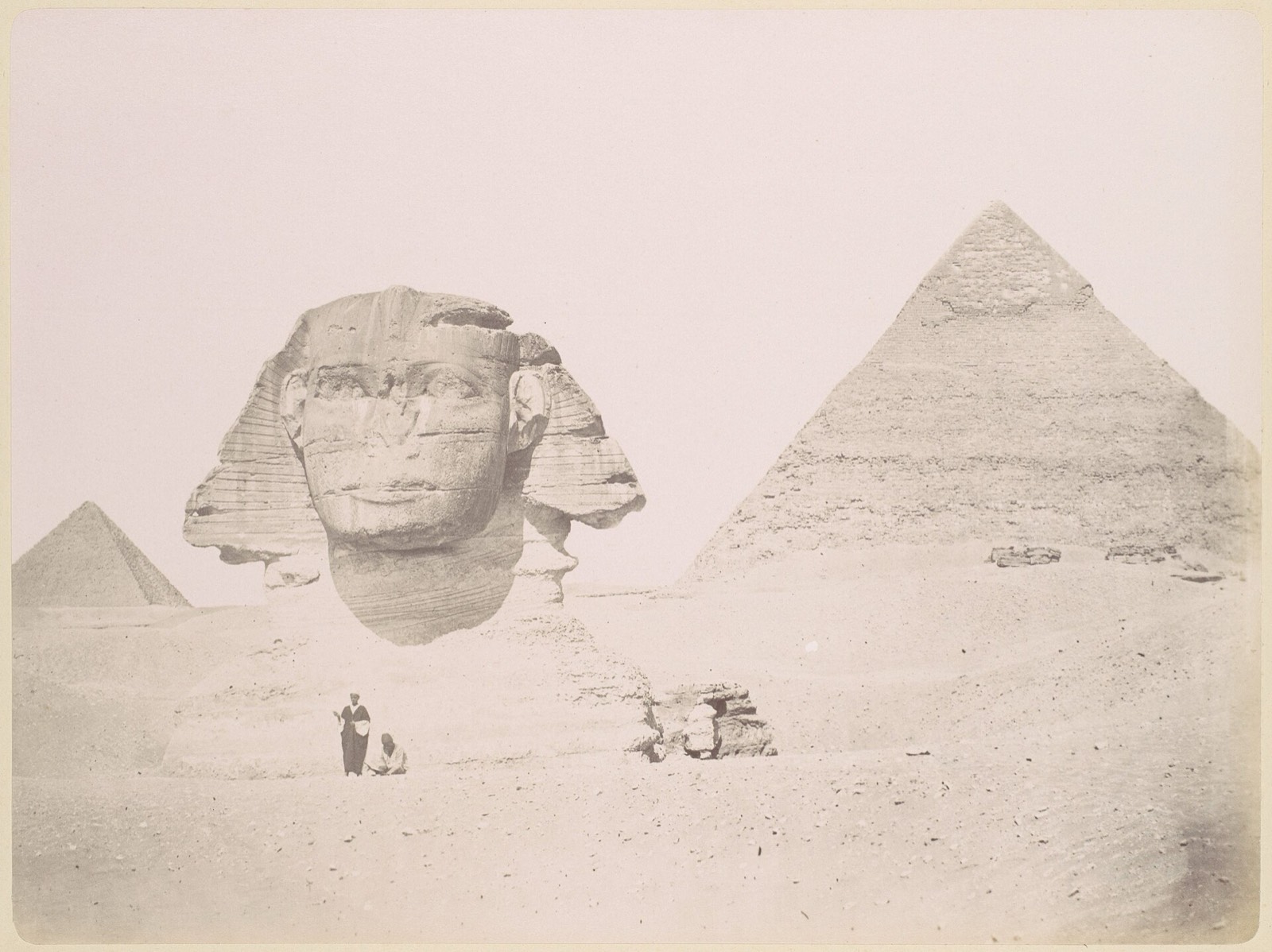 An early photograph of the pyramids and the Sphinx. Compare the sand line here with the Roberts drawing beside it.